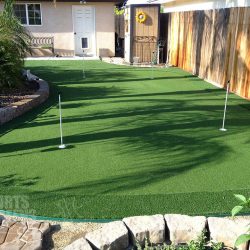 beautiful backyard putting greens by Courts and Greens in Bakersfield